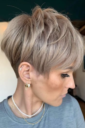 Pixie with Full Bangs for Thick Hair Haircut, side view.