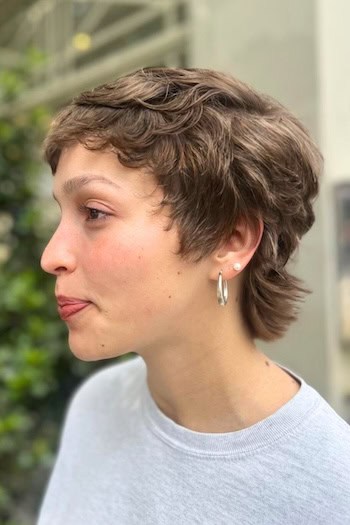 Layered Pixie with Waves and Long Back Haircut