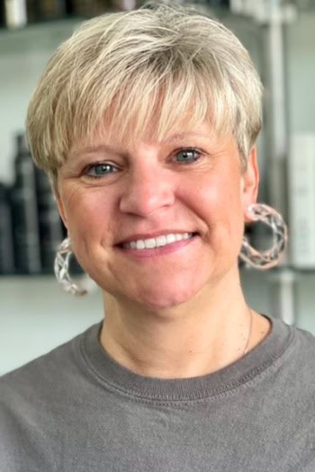 Short Pixie with Heavy Bangs and Layers Haircut