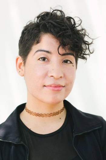 Curly Undercut Pixie with Side Swept Front Haircut