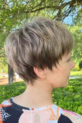 Layered Pixie Bob with Volume Haircut, side view.