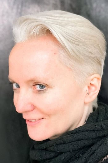 Platinum Slicked Back Pixie Haircut