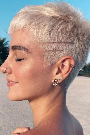 Short Blonde Pixie with Hair Design Haircut, side view.
