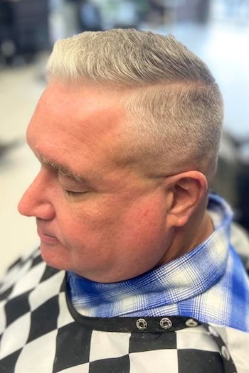 Short Haircut with Side Part and Skin Fade Men's Haircut, side view.