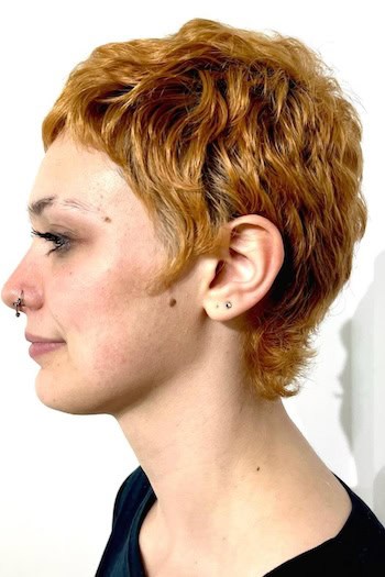 Wavy Pixie for Thick Hair Haircut, side view.