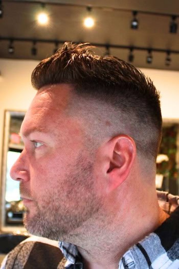 Short and Spiky with Drop Fade Men's Haircut, side view.