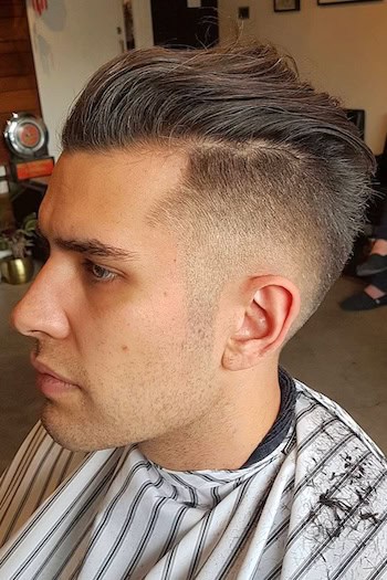 High Fade with Swept Back Top Men's Haircut, side view.