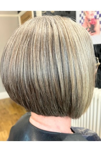 Rounded Bob with Subtle Layers Hairstyle, side view.
