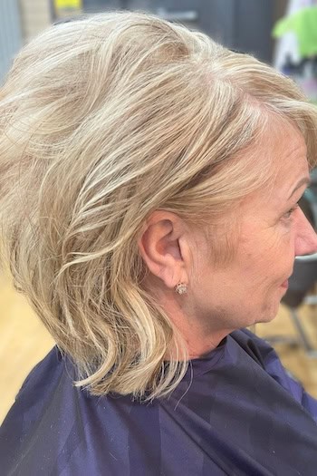Lifted Medium Layers Hairstyle, side view.