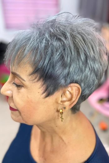 Textured Pixie with Piecey Ends, side view, on a woman in her 60s.