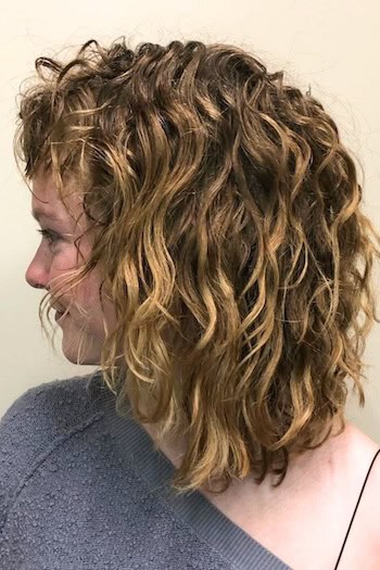 Medium-Length Curly Shaggy Layers Haircut