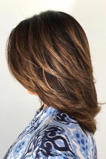 Volumized Medium-Length Layers With Feathered Finish Haircut