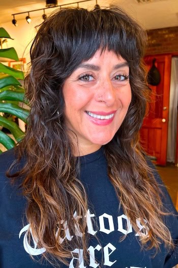 Long Shag With Heavy Texture And Bangs Hairstyle
