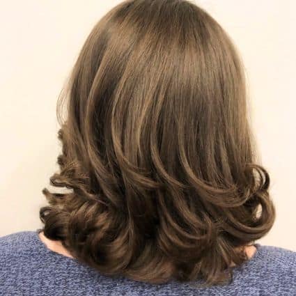Softly Curled Medium-Length Layers Haircut
