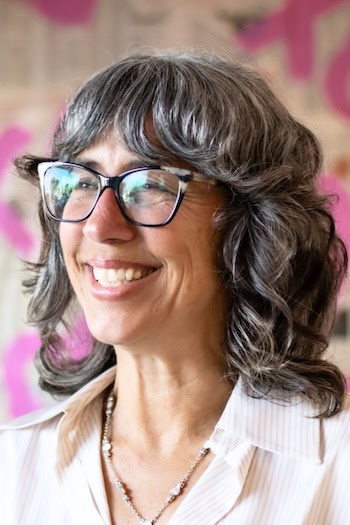 Shoulder-Length Curly Shag With Side Volume Hairstyle