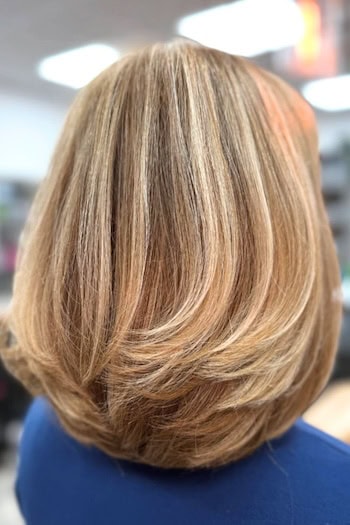 Feathered Lob with Long Layers Hairstyle, back view.