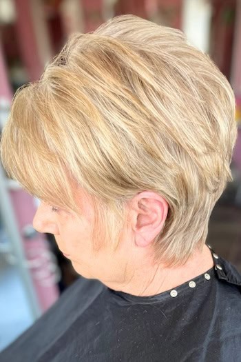 Honey Blonde Voluminous Layered Pixie Haircut
