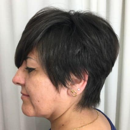 Long Pixie With Layered Volume Haircut, side view.