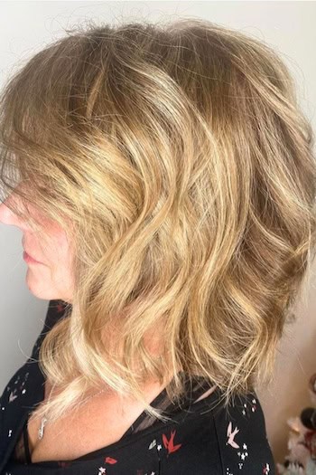 Textured Wavy Lob Hairstyle, side view.