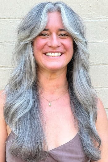 Long Feathered Shaggy Layers With Curtain Bangs For Thick Hair Hairstyle