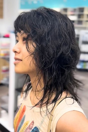 Wavy Medium-Length Wet-Look Shag With Bangs Haircut