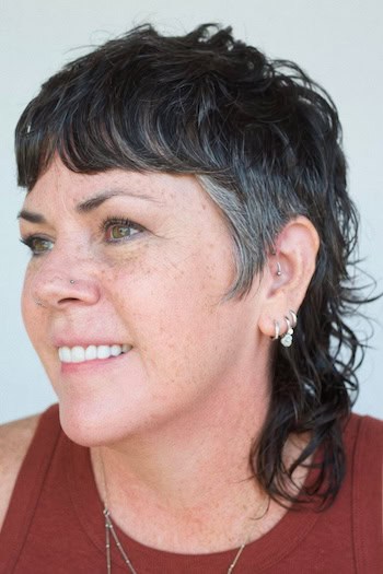 Short Shaggy Mullet With Cropped Bangs Hairstyle