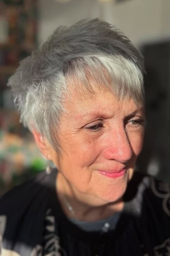 Silver Layered Pixie With Side Fringe Haircut