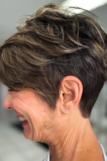 Dark Rooted Pixie With Light Highlights Haircut, side view.