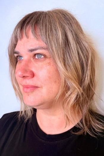 Medium Choppy Shaggy Layers With Micro Fringe Hairstyle