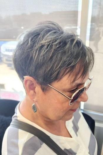 Layered Dimensional Pixie With Bangs Haircut