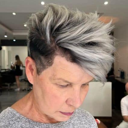 High Volume Silver Pixie With Shaved Sides And Dark Roots Haircut