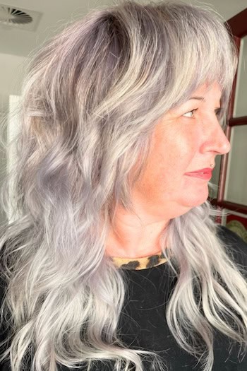 Long Wavy Shag With Bangs Hairstyle