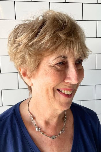 Tousled Golden Pixie With Bangs Haircut