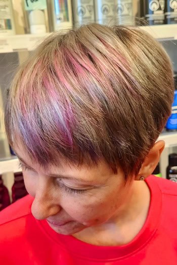 Light Brown Pixie With Pastel Streaks Haircut