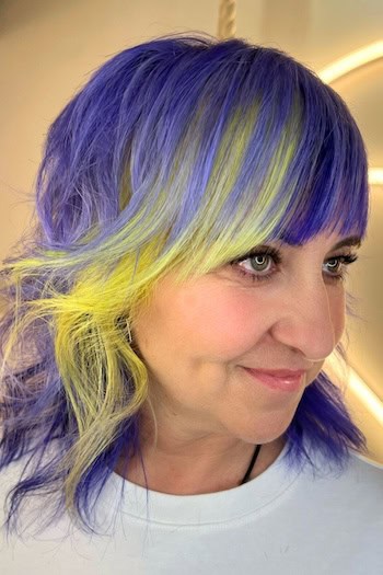 Purple And Yellow Shag With Full Fringe Hairstyle