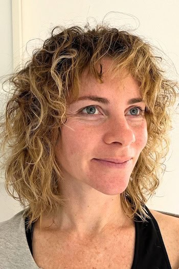 Shaggy Curls With Bangs Hairstyle