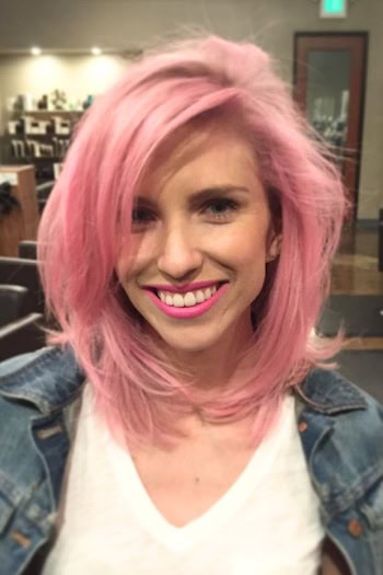 Medium-Length Layers With Deep Side Part Haircut