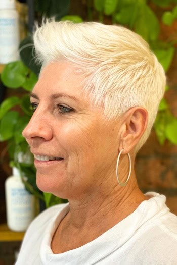 Short Textured Pixie With Volume Haircut, side view.