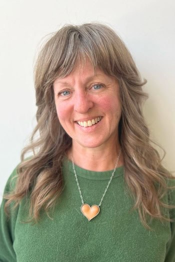Curled Layered Shag With Natural Bangs Hairstyle