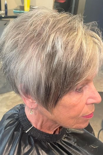 Long Pixie With Volume Haircut, side view.