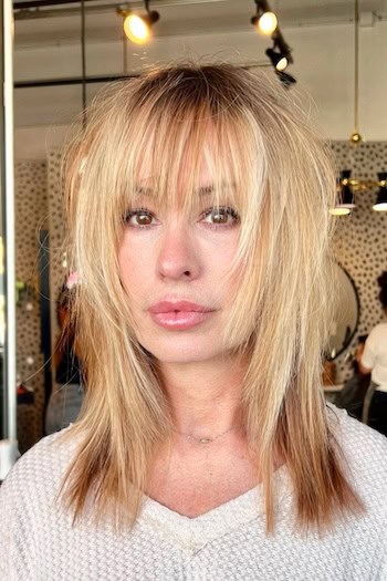 Straight Layered Shag With Long Bangs Hairstyle