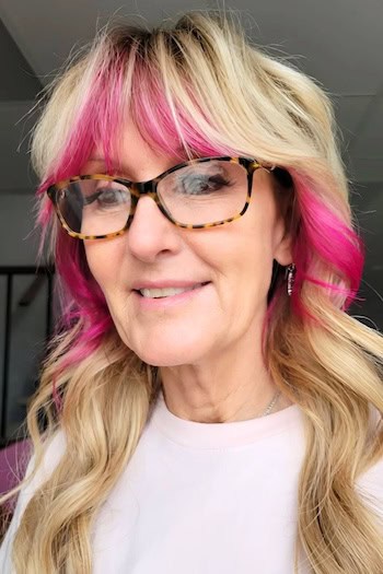 Long Blonde Shag With Hot Pink Streaks And Bangs Hairstyle