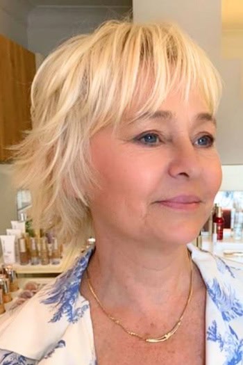 Short Shaggy Layers With Choppy Bangs Hairstyle