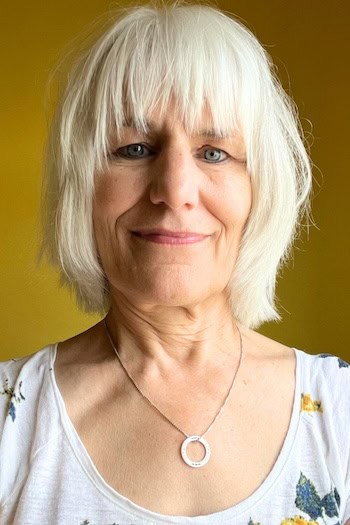 Short White Shaggy Bob With Full Bangs Hairstyle