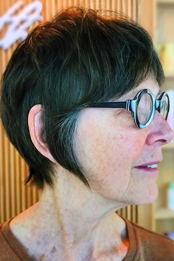Short Tapered Pixie Shag With Long Sweeping Bangs Hairstyle