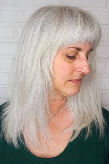 Straight Shag With Blunt Bangs And Soft Layers Hairstyle