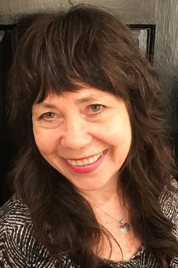 Long Wavy Shag With Textured Fringe Hairstyle