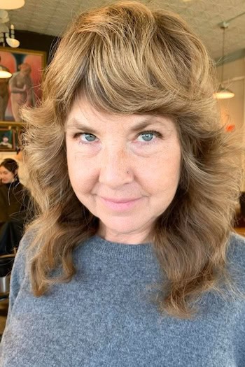 Feathered Shag With Fluffy Crown Layers Hairstyle
