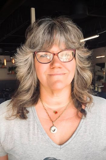 Medium-Length Feathered Shag Hairstyle