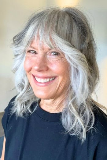 Wavy Shag With Piecey Curtain Bangs Hairstyle